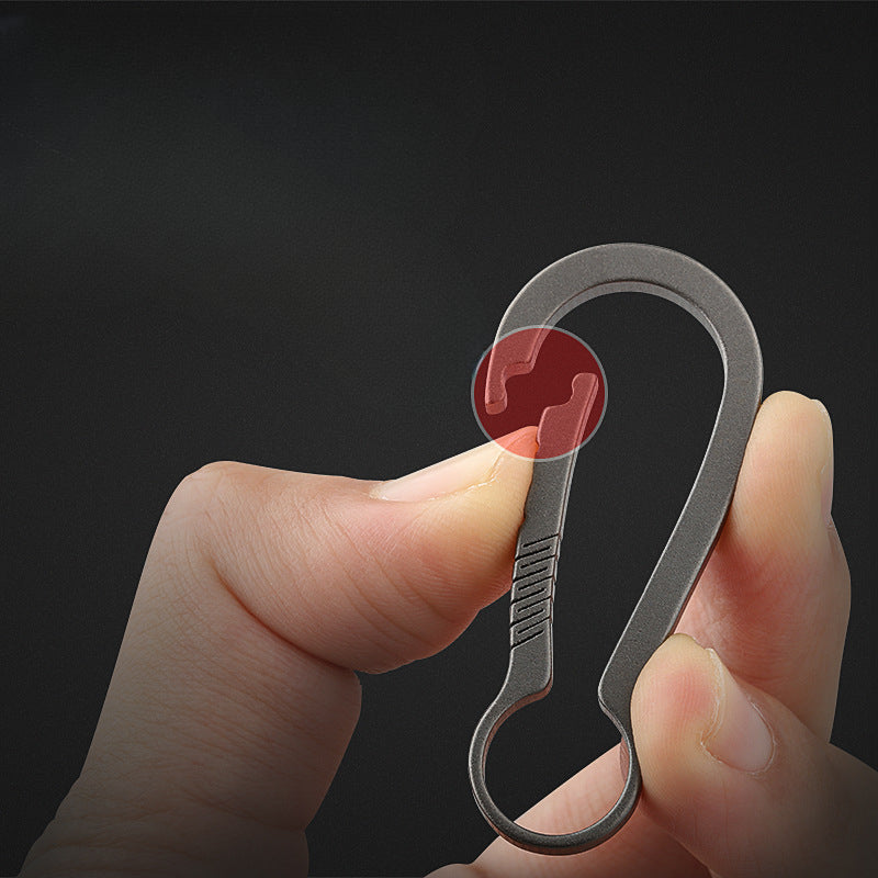 Sleek Titanium Keychain Clip with Innovative Car Accessory Design
