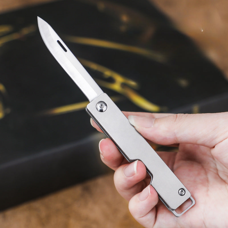 Compact Titanium Folding Knife for Outdoor Adventures and Keychain Use