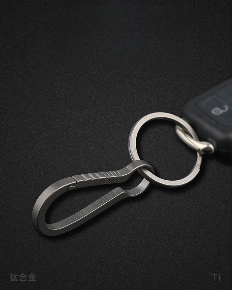 Sleek Titanium Keychain Clip with Innovative Car Accessory Design