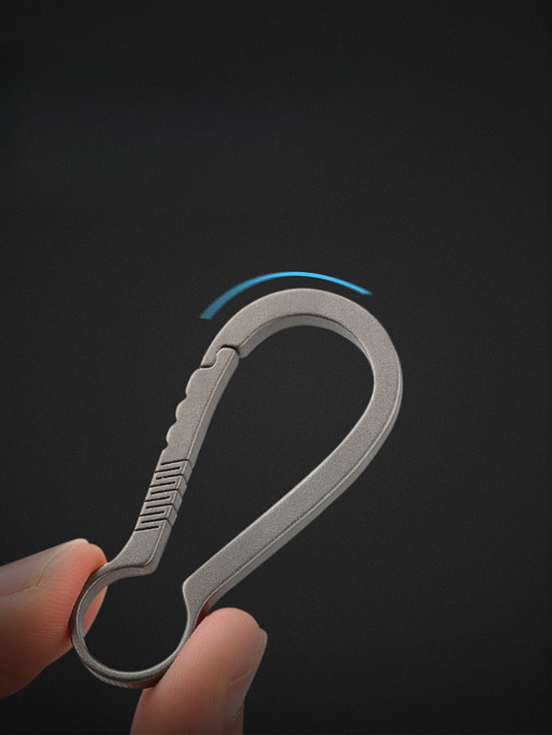 Sleek Titanium Keychain Clip with Innovative Car Accessory Design