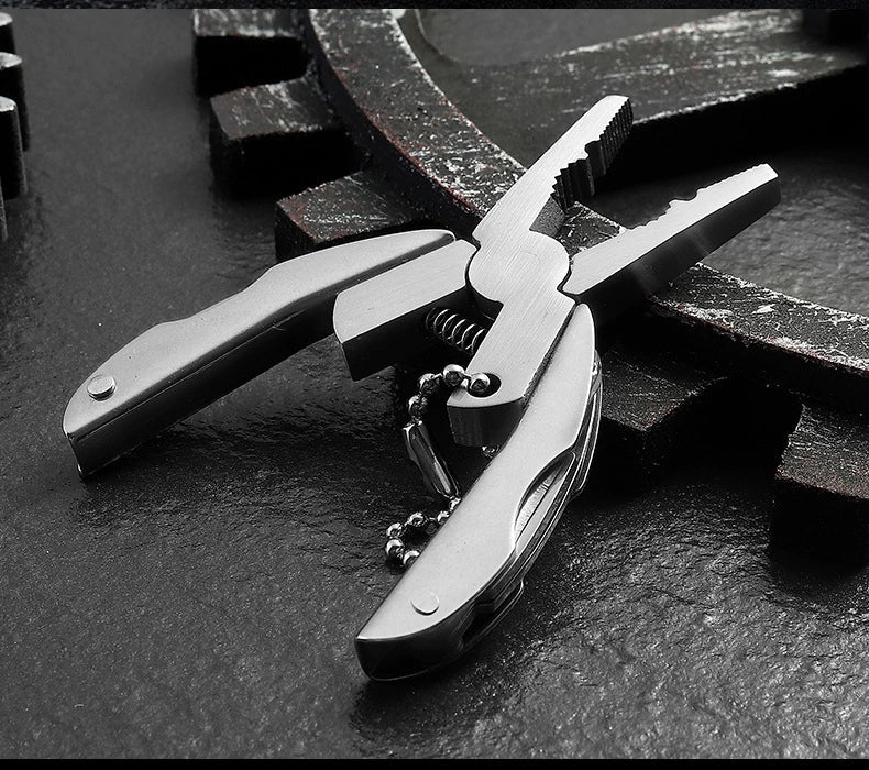 Versatile Scarab Shell Multi-Tool with Integrated Folding Mini-Plier