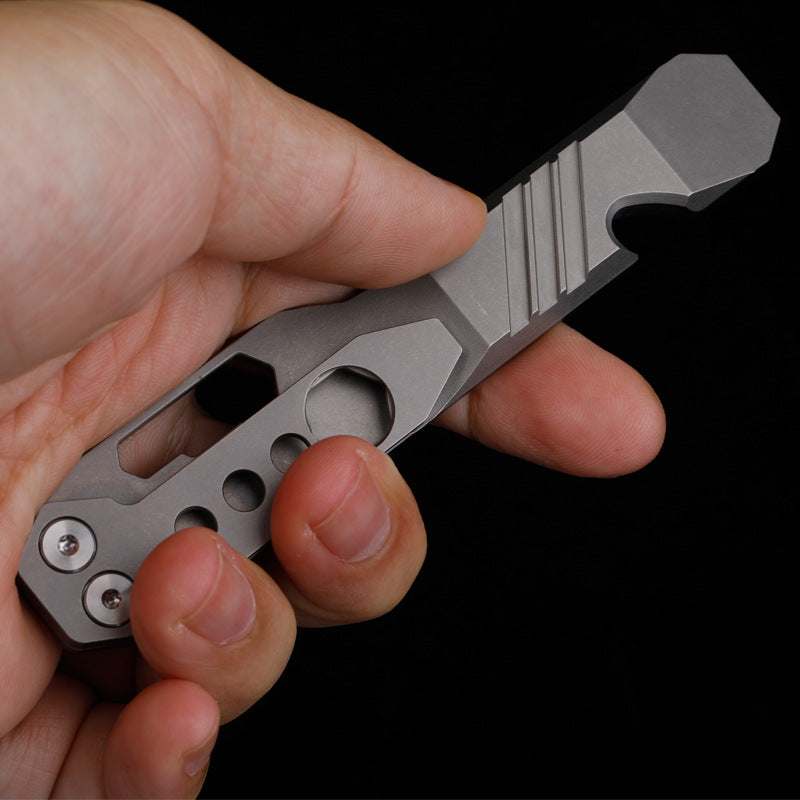 Titanium Tool with Pry Bar, Screwdriver, Bottle Opener, and Survival Wrench